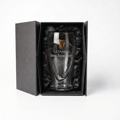 A clear Guinness Pint Glass from Guinness Webstore US, elegantly etched with “Guinness Best Dad Ever” and presented in a luxury gift box lined with black satin.