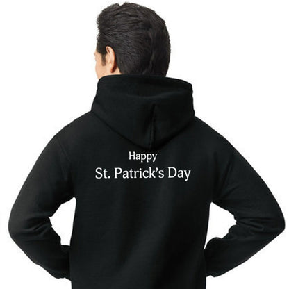 A man in a Guinness St. Patrick's Day Shamrock Pint Black hoodie celebrates St. Patrick's Day with cheer.