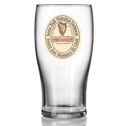 The Guinness Vintage Label Pint Glass from Guinness Webstore US features a clear pint design with a vintage Guinness label printed on the front.