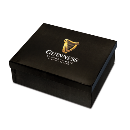 Black rectangular Guinness Gift Box - Medium featuring a gold harp logo and the text “Guinness St. James’s Gate Dublin, Ireland” on the lid.
