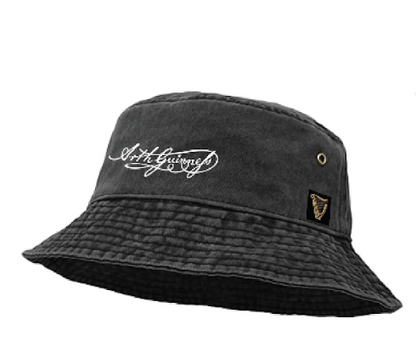 Guinness Signature Bucket Hat featuring embroidered script and a small badge on the side, providing stylish sun protection.