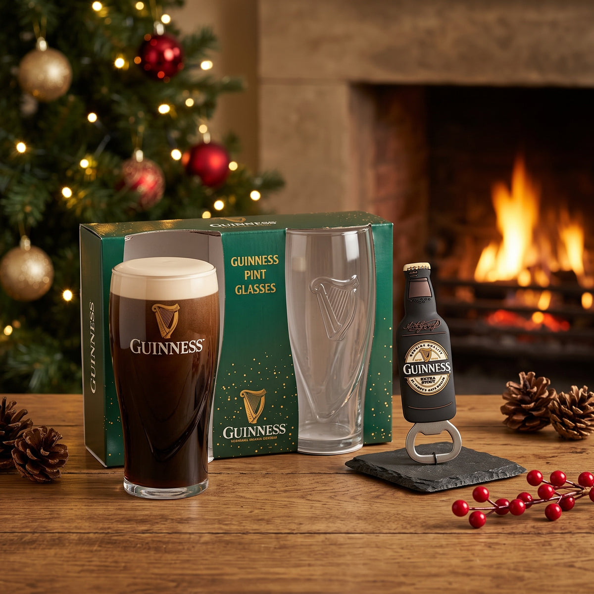 A Guinness Perfect Pint Gift Set from Guinness Webstore US sits by a lit fireplace and decorated Christmas tree, ready to enjoy.