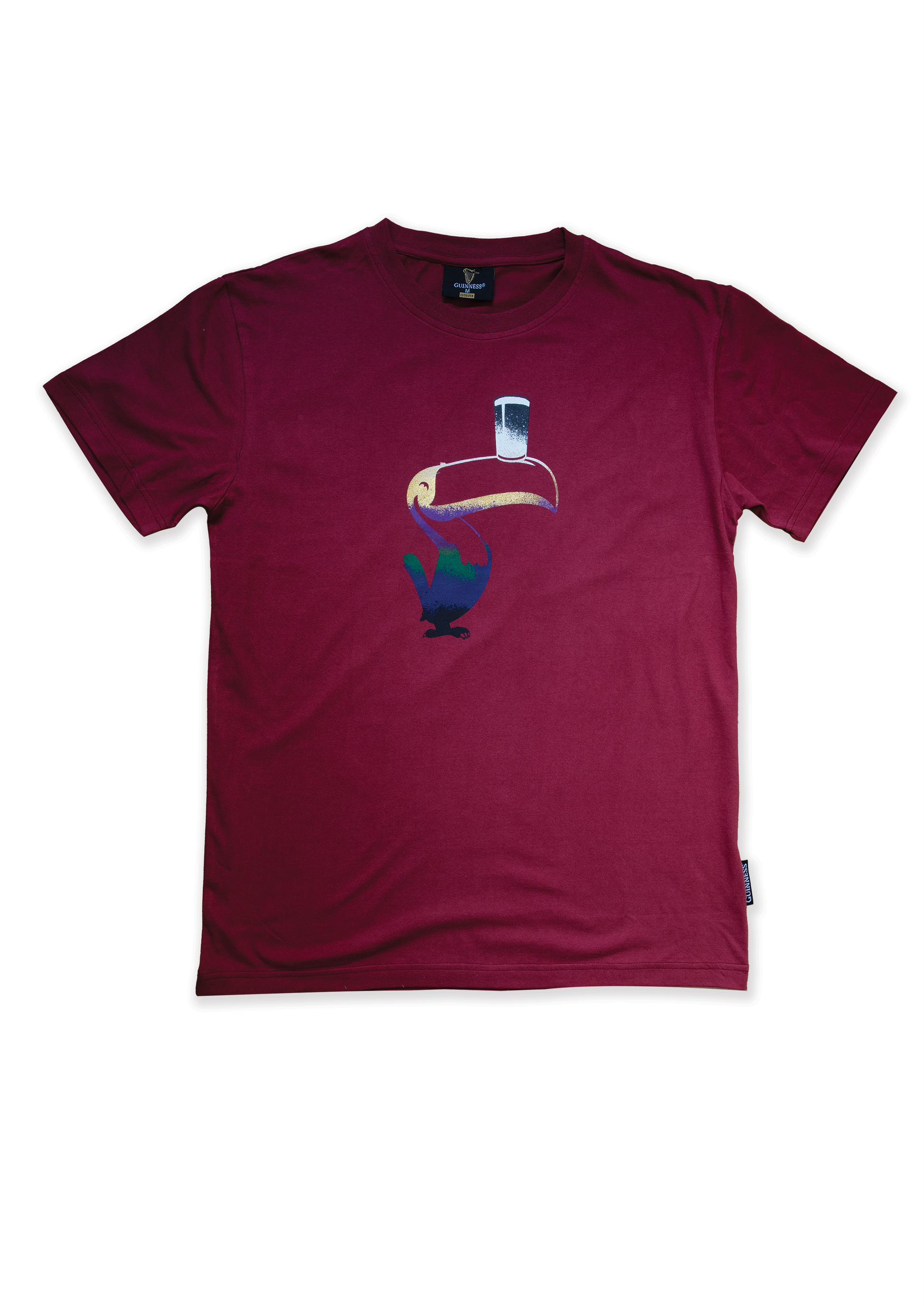 A Guinness Liquid Toucan Tee - Red with an image of a bird on it.