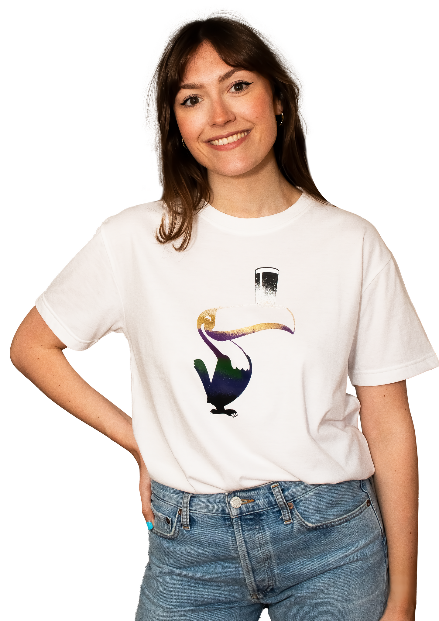 A woman smiling with her hand on her hip, wearing a White Guinness Liquid Toucan Tee made of BCI cotton.