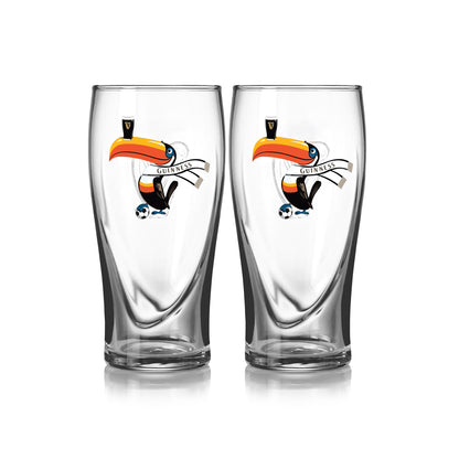 The Guinness Webstore US Soccer Pint Glass 2 Pack—Special Edition features two clear pint glasses with a Guinness banner and iconic toucan, perfect for true fans.