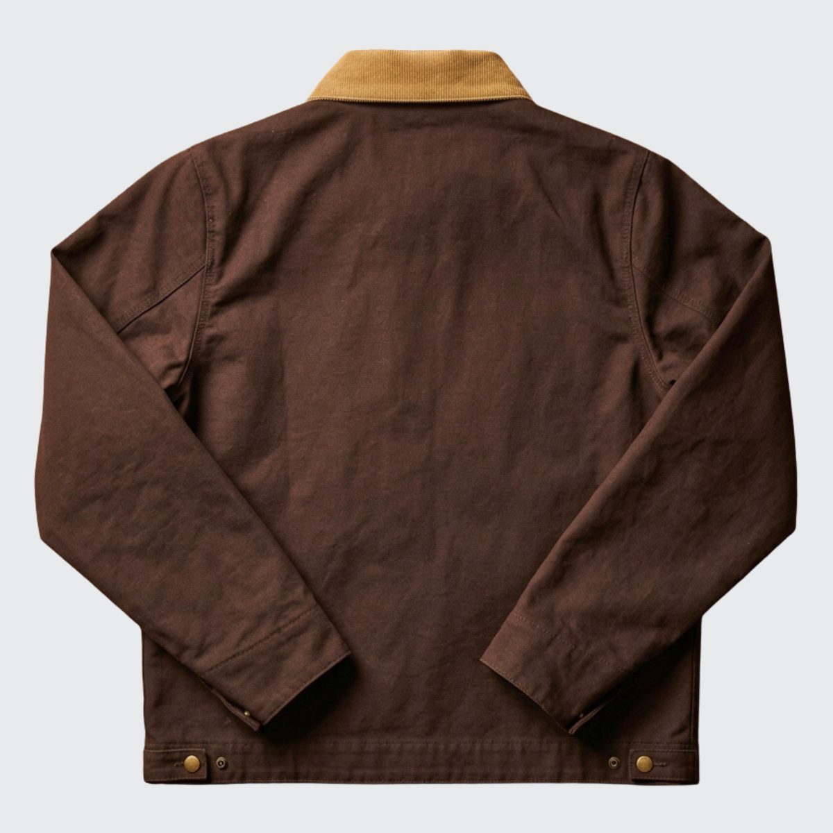Guinness Cooperage Work Jacket by Guinness Webstore US features a tan collar, long sleeves, button cuffs, and plain back in heavyweight cotton canvas. Shown flat on light gray background.