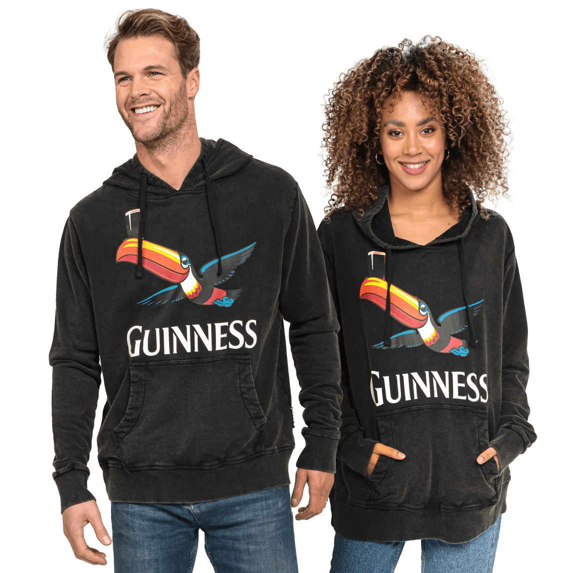 Two people wearing Guinness Premium Label Toucan Hoodies.