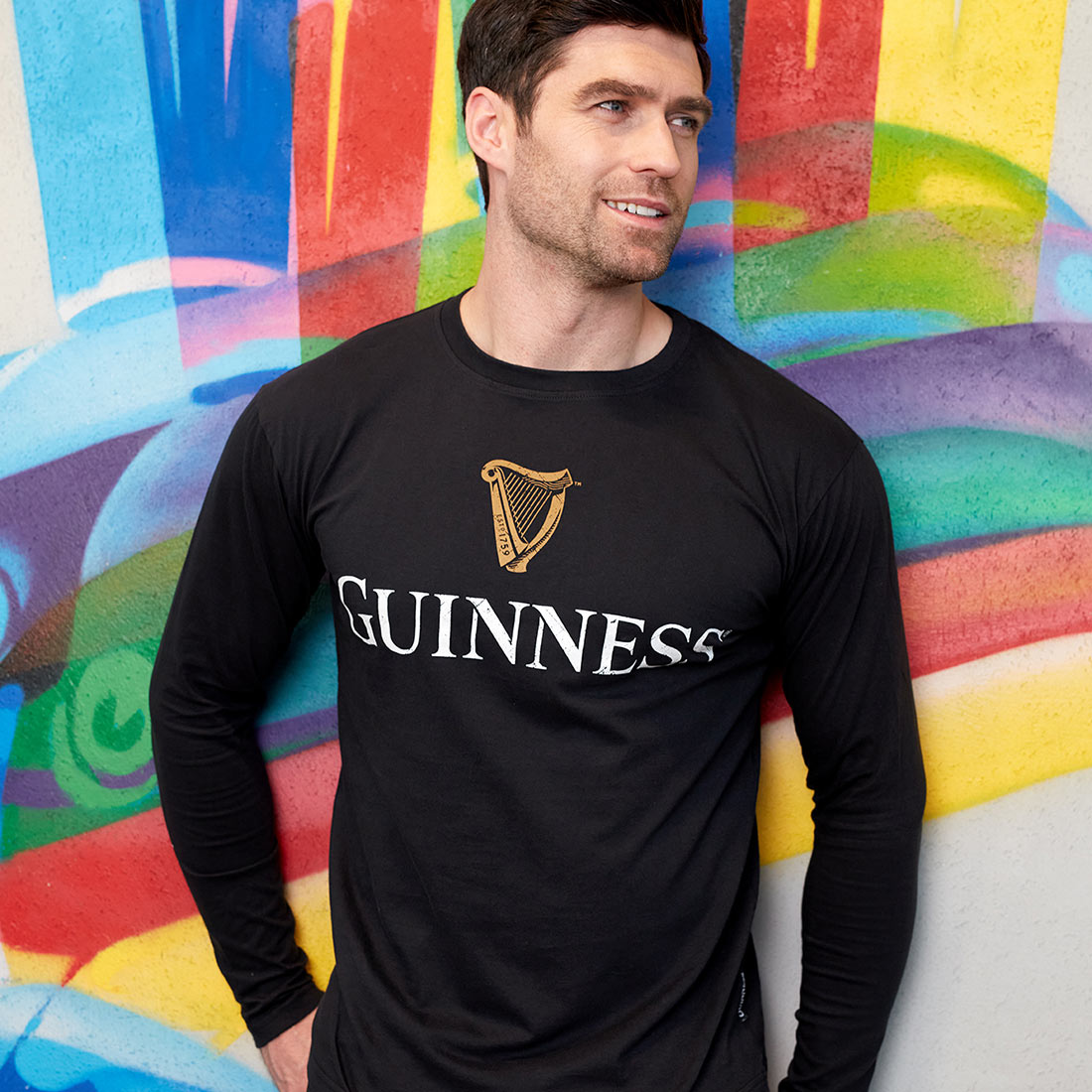 Guinness Black Trademark label Long sleeve Premium tee shirt is a trendy garment featuring the iconic Guinness trademark.