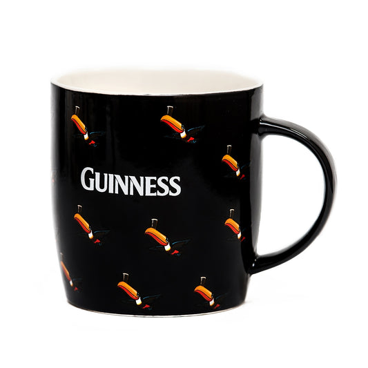 Guinness Black Mug adorned with Multiple Flying Toucans.