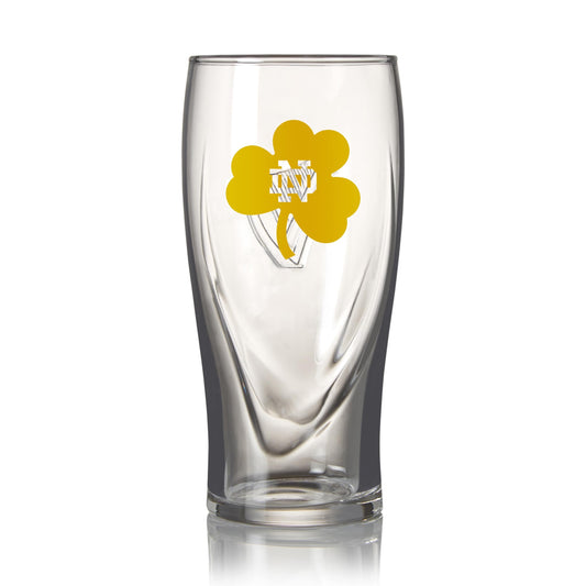 A Notre Dame Guinness Shamrock 16oz Pint Glass with a shamrock on it.