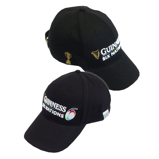 Two black Guinness Six Nations baseball caps, one featuring a gold harp, displayed on a white background.