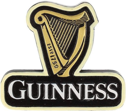 An image showcasing the Guinness logo features a gold harp above the white text "GUINNESS" with "ESTD 1759" inscribed on the harp—a true Irish touch captured perfectly in this Guinness Harp Magnet, available from Guinness Webstore US.