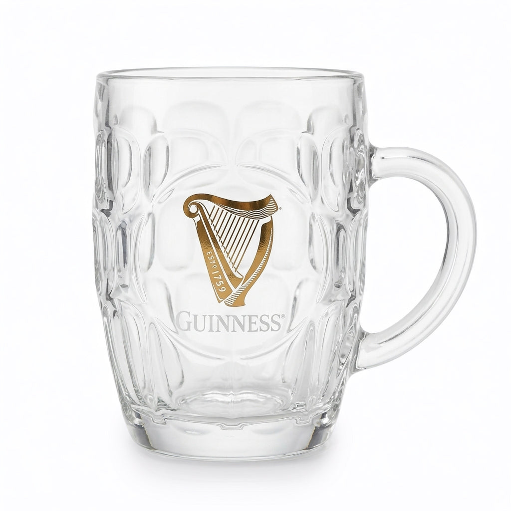 The Guinness Webstore US 20 oz Guinness Gold Harp Dimple Glass Mug features the iconic gold harp logo and handle—an ideal tankard for any Irish pub mug collection.